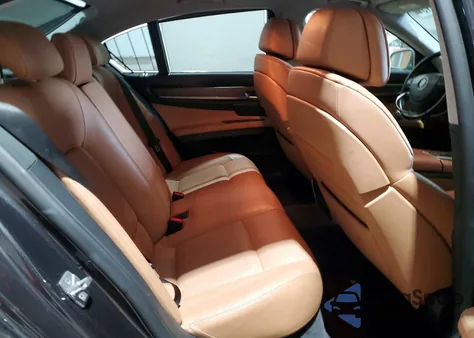 2011 BMW 750 Xi z USA, uszkodzony, nr VIN WBAKC6C55BC395401